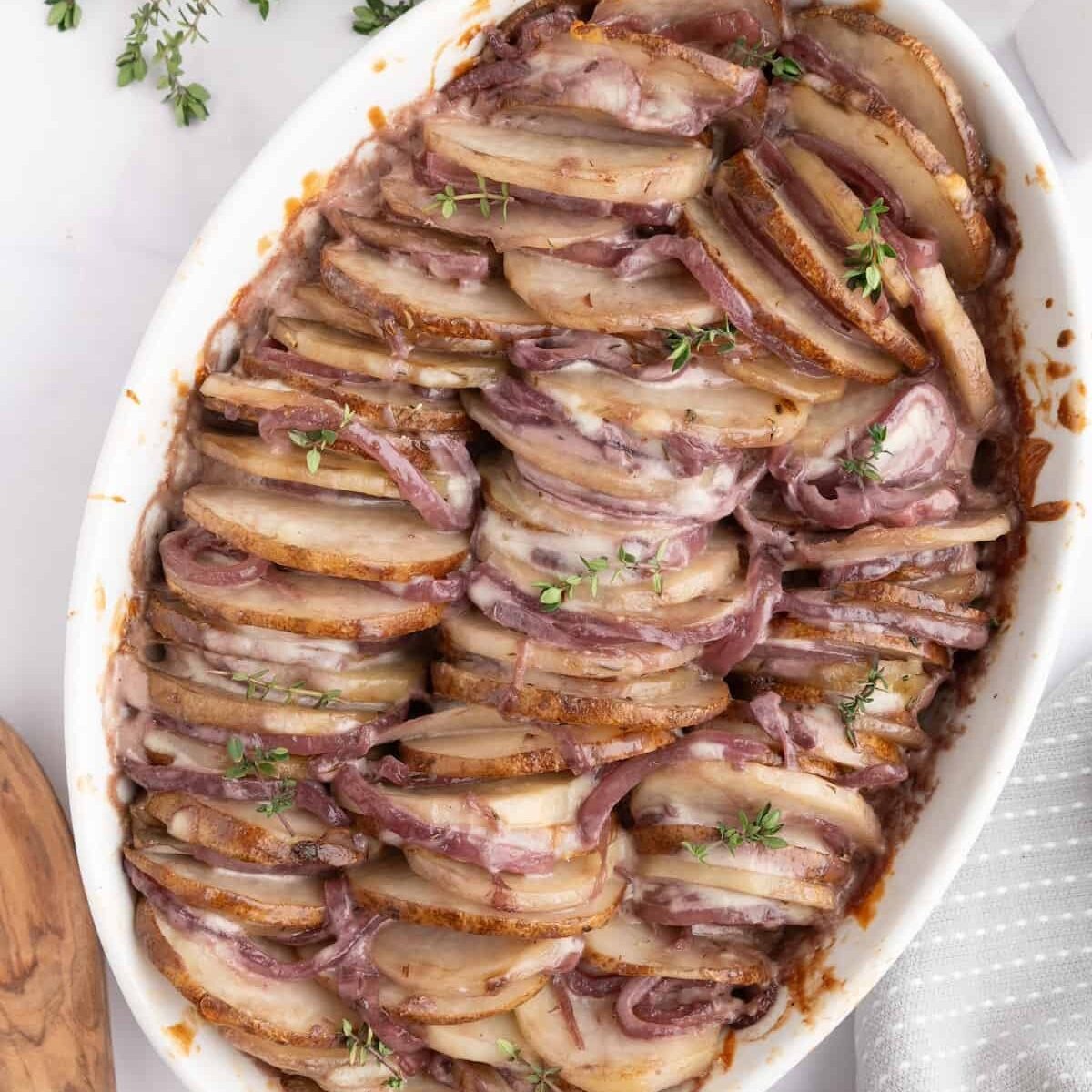 Delicious baked French onion beef casserole with caramelized onions and melted cheese.